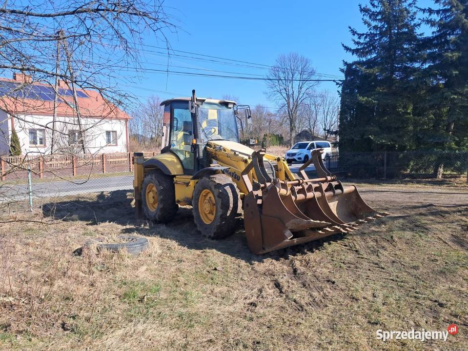 Komatsu wb97s z 2004r sprowadzona Rok produkcji 2004 podkarpackie Mielec