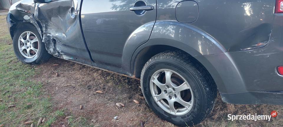 Uszkodzony Citroen CCrosser22HDI reflektory ksenonowe Trąbki
