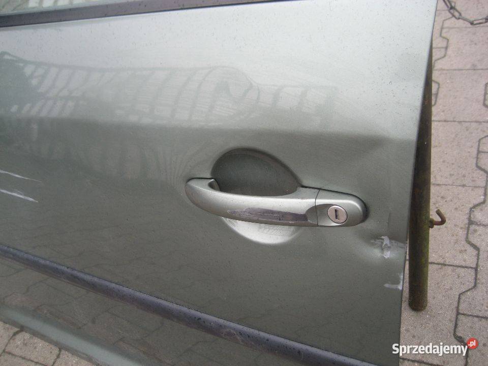 vw caddy 0314r drzwi przód lewe uszkodzone Rakoniewice