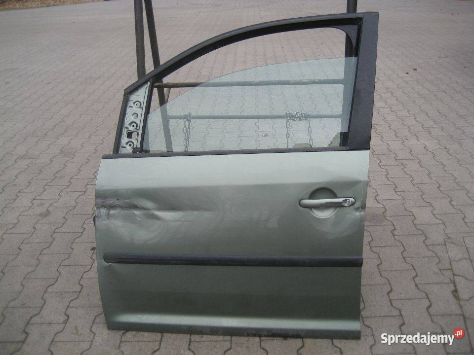 vw caddy 0314r drzwi przód lewe uszkodzone Rakoniewice