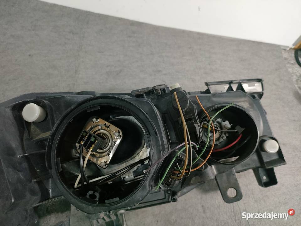 Megane II lift lewa lampa przód europa wielkopolskie Swarzędz