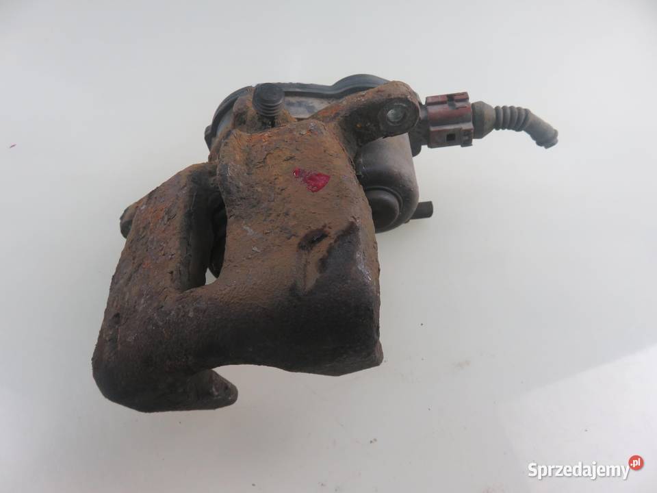 ZACISK LEWY TYŁ AUDI A4 B8 18 TFSI osobowe