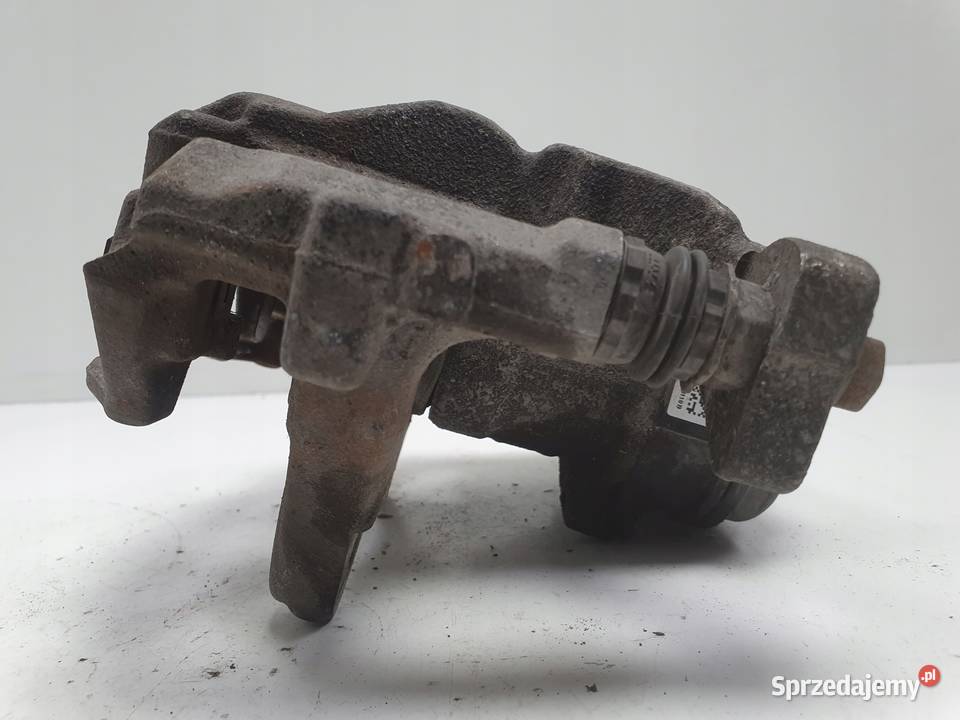 Toyota Corolla XII E21 TYLNY ZACISK HAMULCOWY