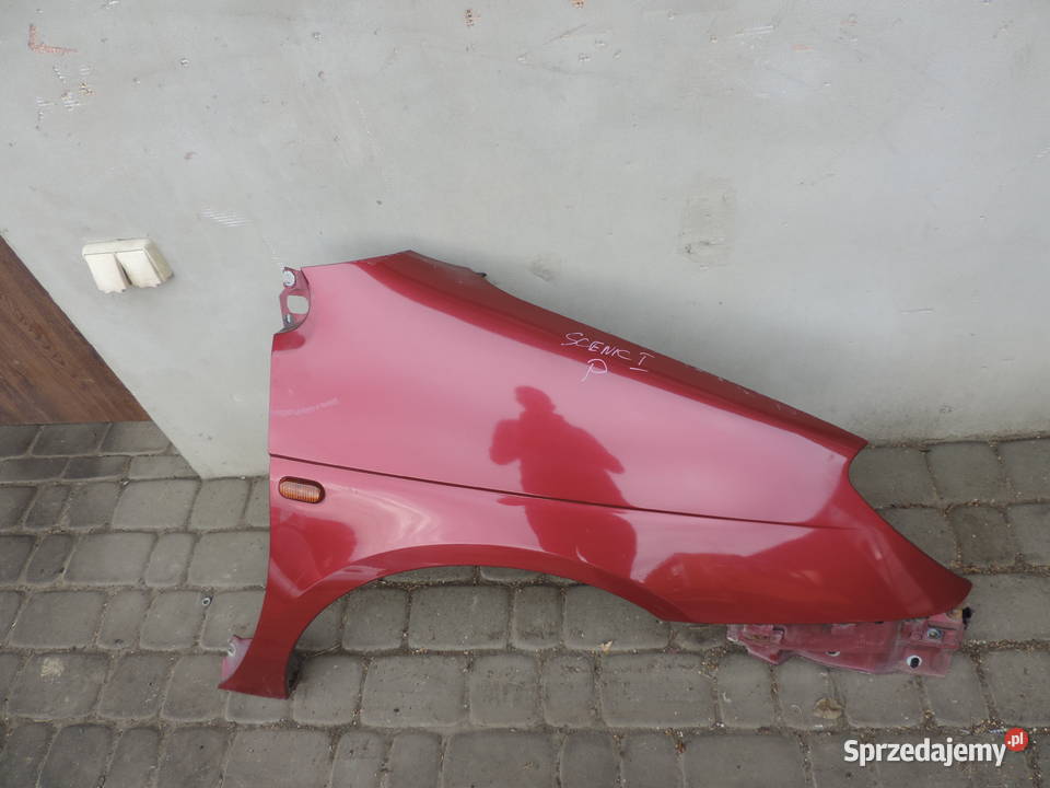 BŁOTNIK PRAWY PRZEDNI RENAULT SCENIC 1 FL NV713 Nowy Sącz