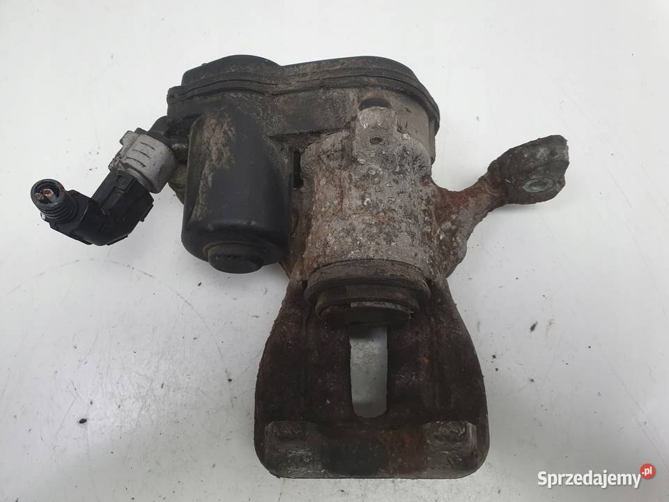 Toyota Yaris IV TYLNY ZACISK HAMULCOWY lewy tył Nawigacje fabryczne