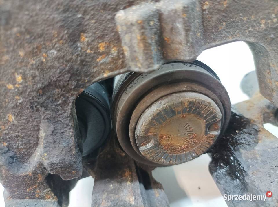 ZACISK HAMULCOWY LEWY TYŁ ELEKTRYCZNY 3V 20 TSI sprzedam