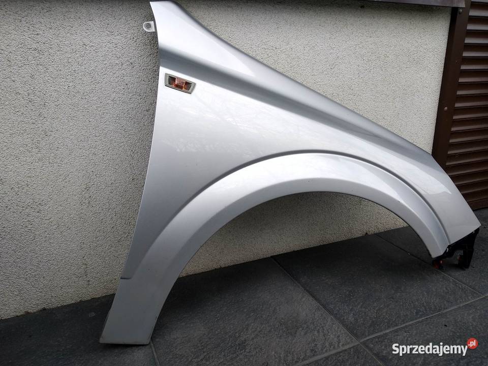 Opel Astra H błotnik przedni lewy srebrny Z157 osobowe Sieradz