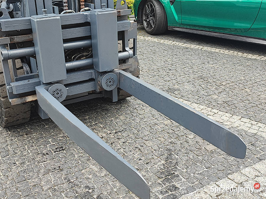 Pozycjoner z widłami obrotowymi Kaup 15T 411D Wózki widłowe Kęty