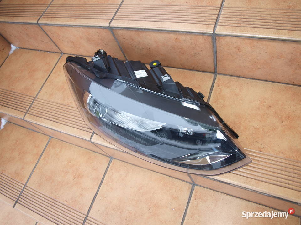 VW Polo lampa prawa przód 2009 2017r europa Oświetlenie Kalisz