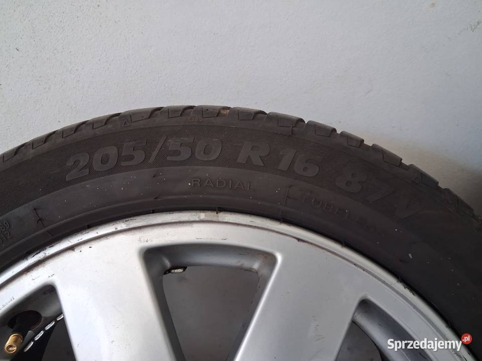 Felgi aluminiowe Nissan R16x7J ET40 z oponami Chocianów