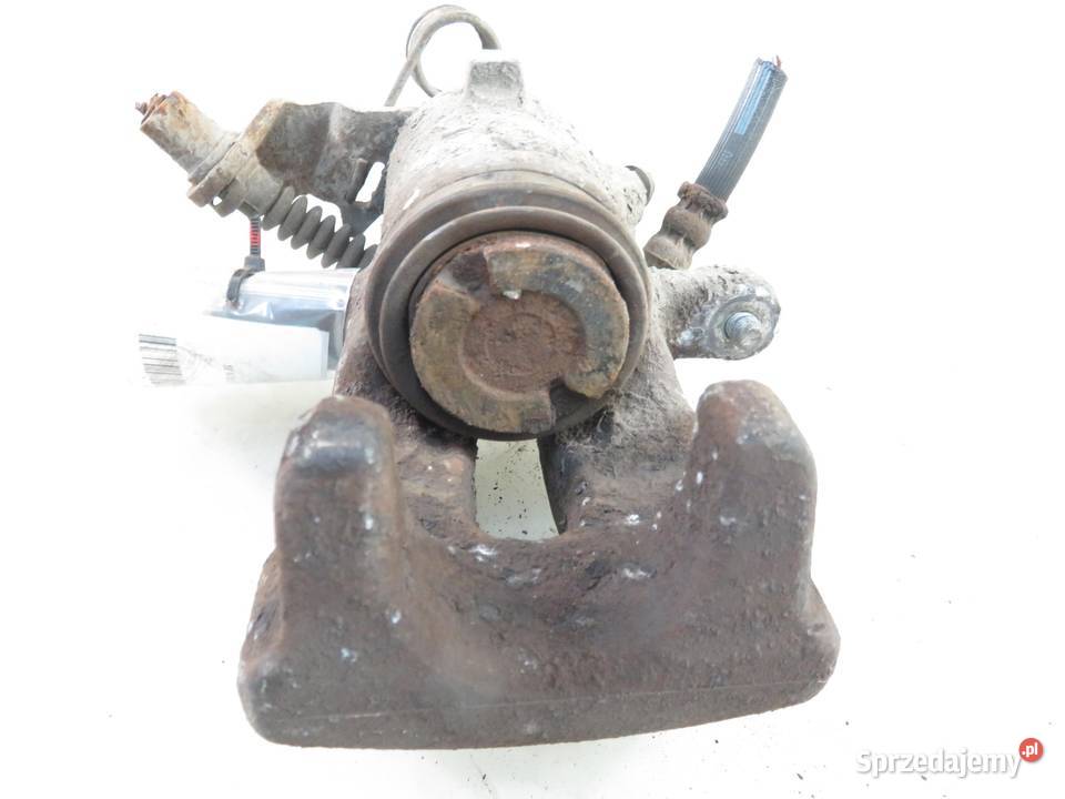 ZACISK LEWY TYŁ OPEL ZAFIRA B 19 CDTI