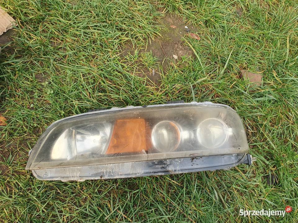Lampa przednia lewa Fiat Punto II dwójka 9803