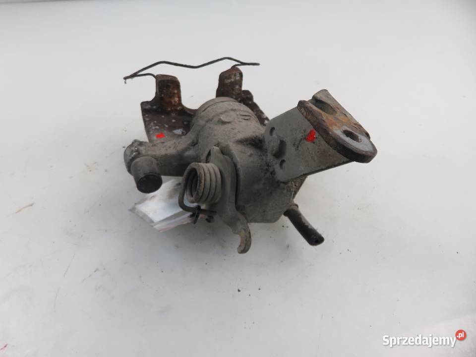 ZACISK LEWY TYŁ NISSAN PRIMERA P12