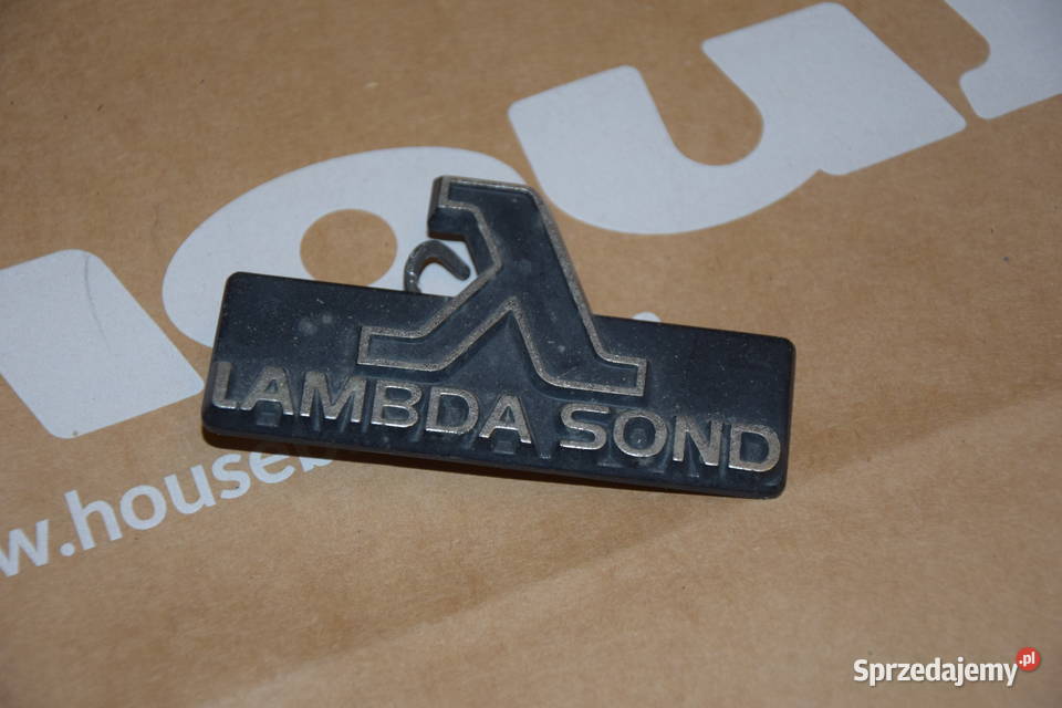 Emblemat LAMBDA SOND w grill Volvo 740 940 960
