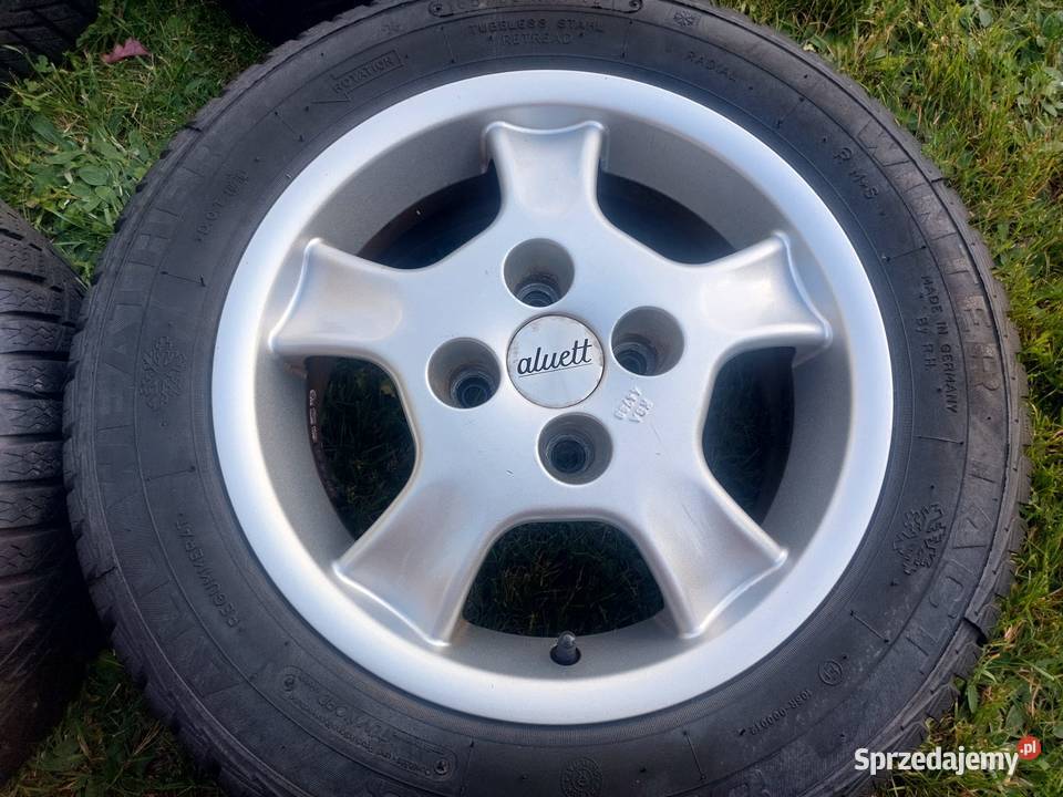Felgi aluminiowe 14 18560R14 opony zimowe Toyota Sieciechów