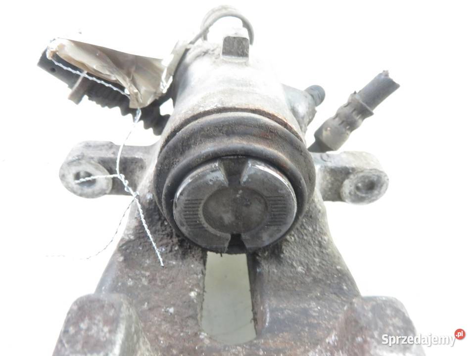 ZACISK LEWY TYŁ OPEL ASTRA III H 17 CDTI osobowe