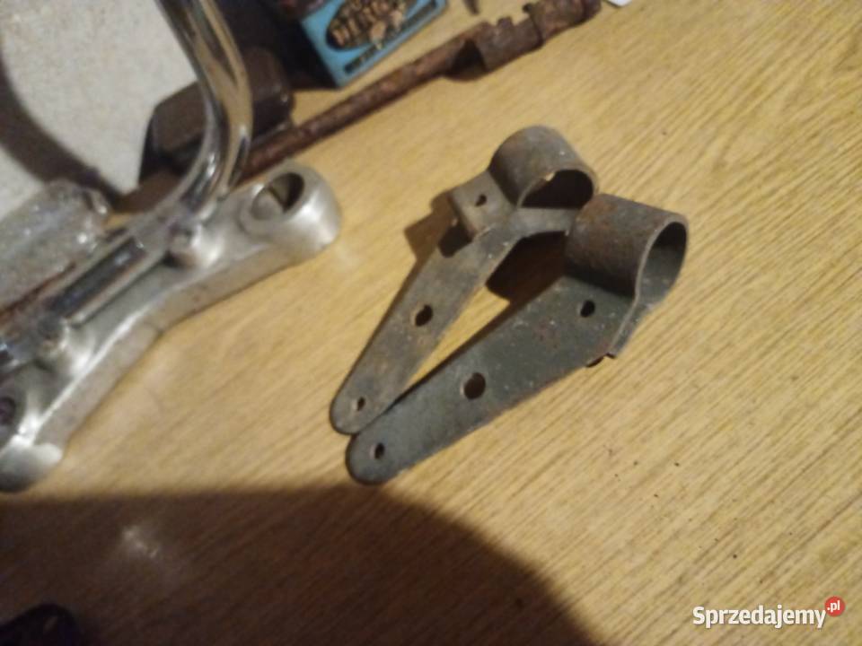 Uchwyt lampy WSK Bąk Sport lelek lewy Piszczac