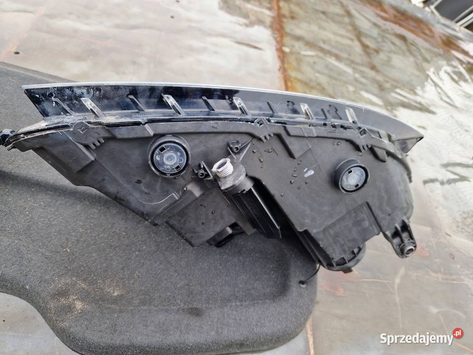 VW Passat B7 reflektor ORG KPL EU Mielec