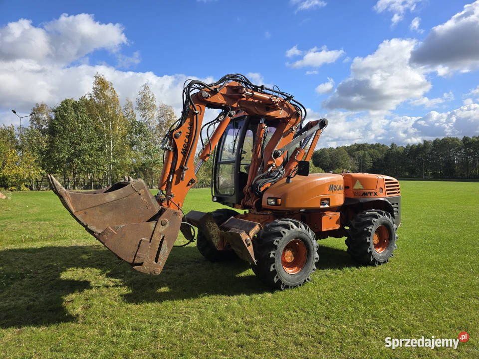Koparka wielofunkcyjna MECALAC 12 MTX z zestawem