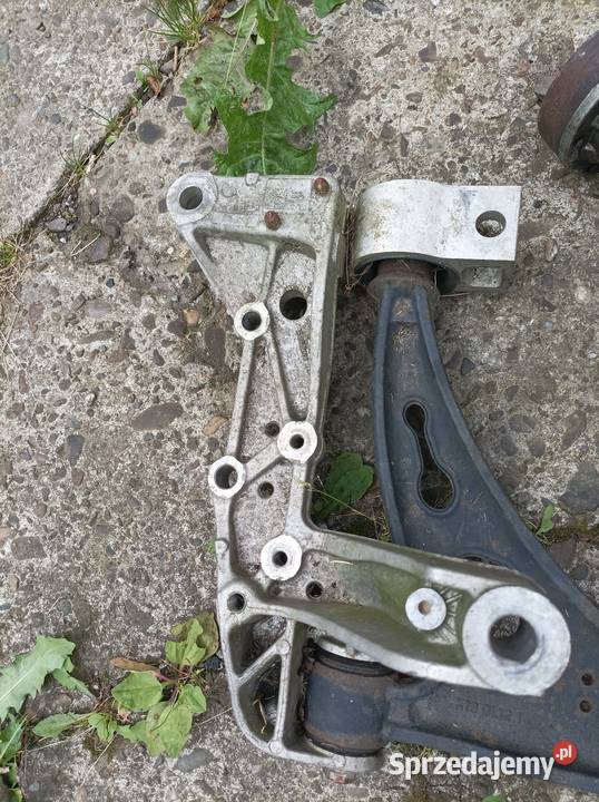 1K0199295F VW Audi Seat Skoda wspornik mocowani Motoryzacja Skoczów