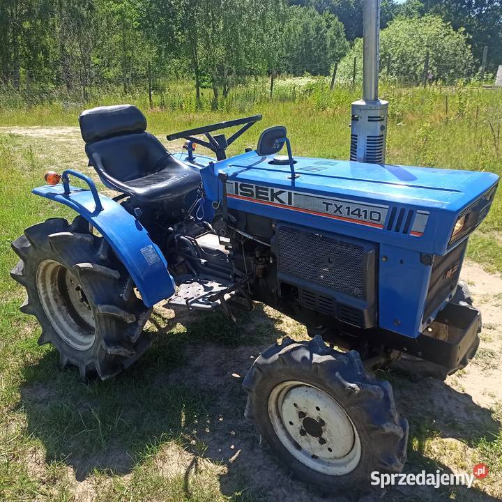 Iseki TX1410 z glebozgryzaką pług brony i belka Iseki Bieszkowice