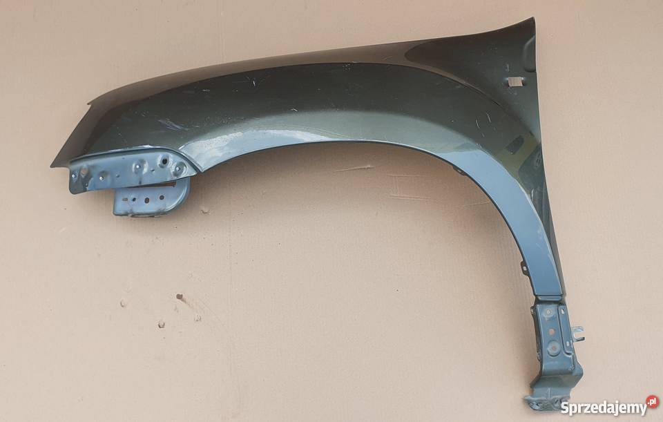 DACIA DUSTER BŁOTNIK LEWY PRZÓD