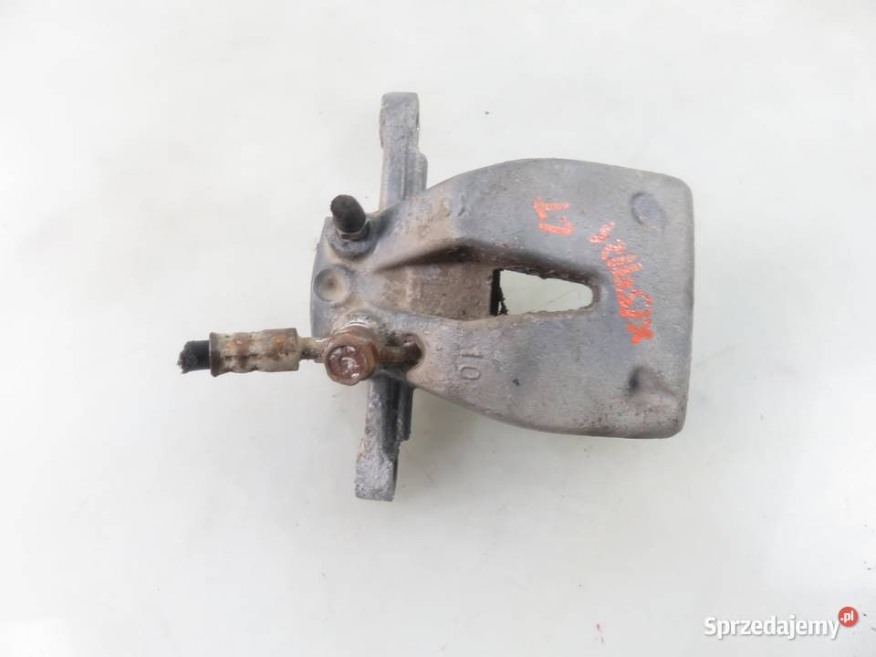 ZACISK LEWY TYŁ TOYOTA AVENSIS II T25 osobowe małopolskie
