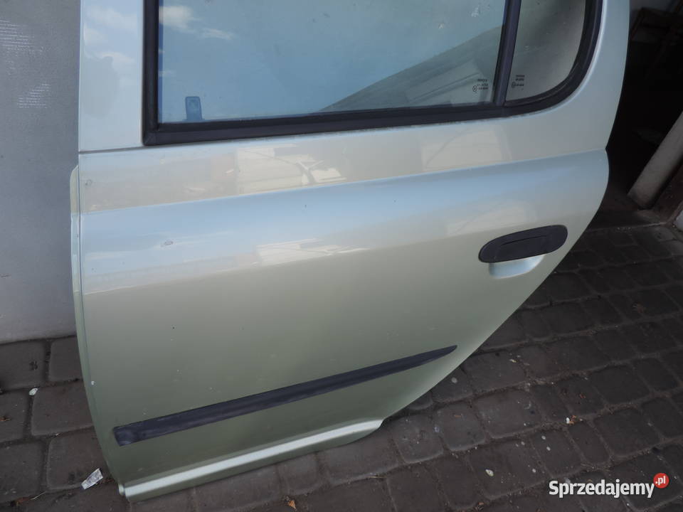 DRZWI LEWY TYŁ TOYOTA YARIS 1 HB 6Q2 osobowe Nowy Sącz