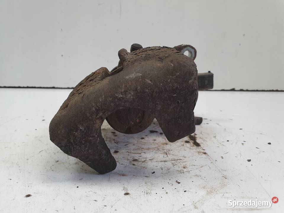 Audi A4 B8 TYLNY ZACISK HAMULCOWY prawy tył Janów
