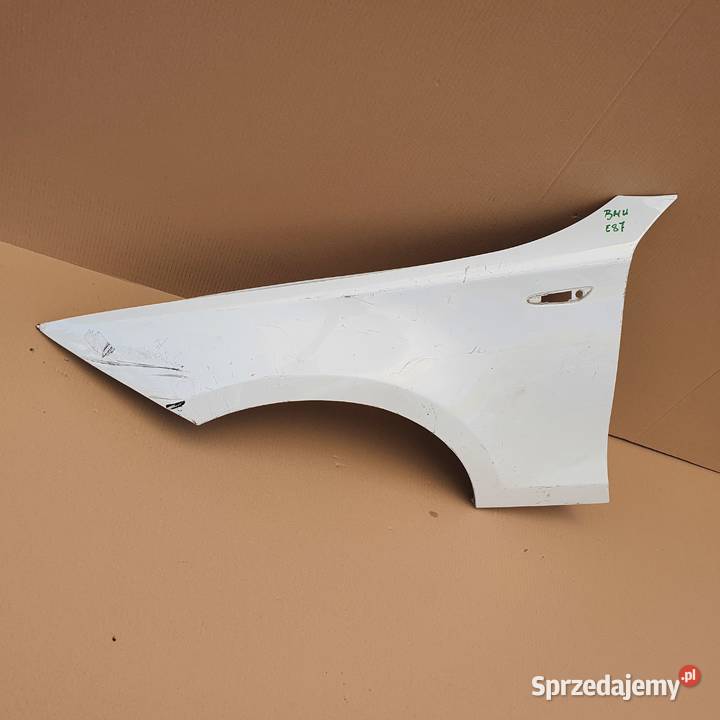BMW 1 E87 BŁOTNIK LEWY PRZÓD części blacharskie Karoseria Trzciel