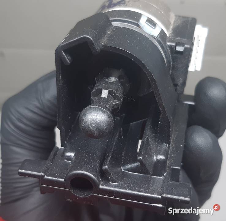 SILNICZEK REGULACJI LAMPY AUDI VW 74862101AB osobowe dolnośląskie