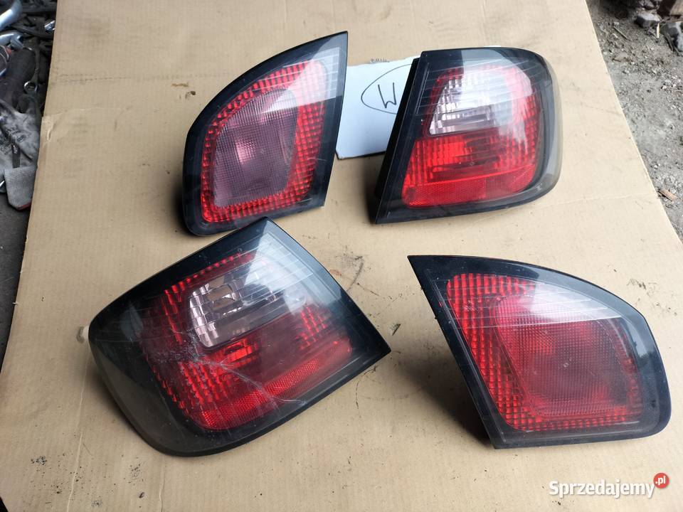 NISSAN PRIMERA P11 LIFT LAMPA TYŁ TYLNA LEWA osobowe Kamień-Kolonia