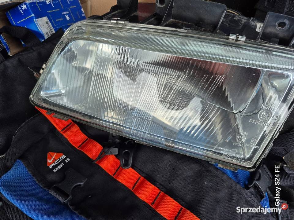 Peugeot 405 oryginalny lewy reflektor CIBIE Białystok sprzedam