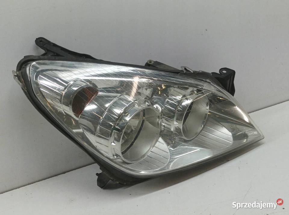 LAMPA PRZÓD 13239289 1EG27037042 Opel Astra III