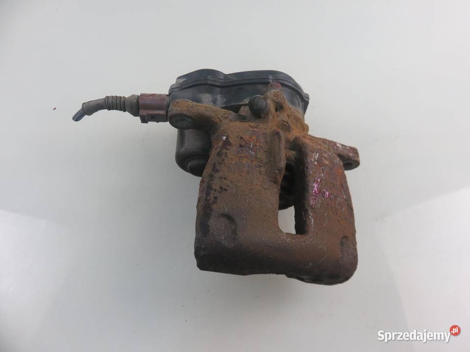 ZACISK PRAWY TYŁ AUDI A4 B8 18 TFSI CABB