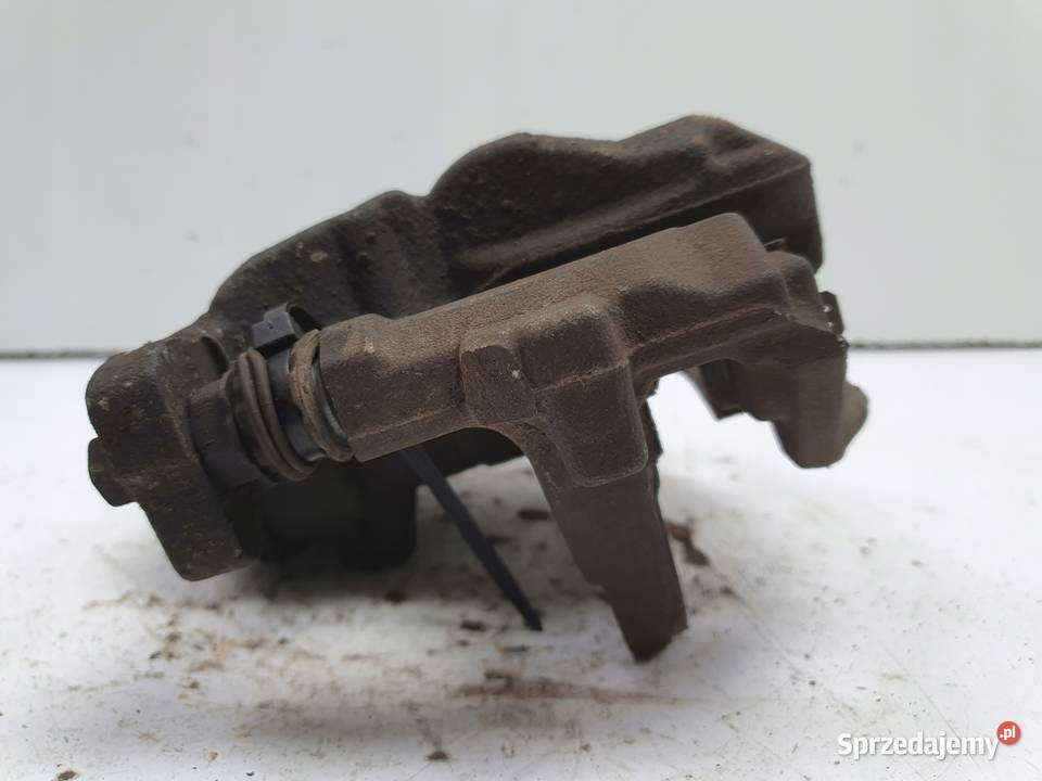 Toyota Corolla XII E21 TYLNY ZACISK HAMULCOWY