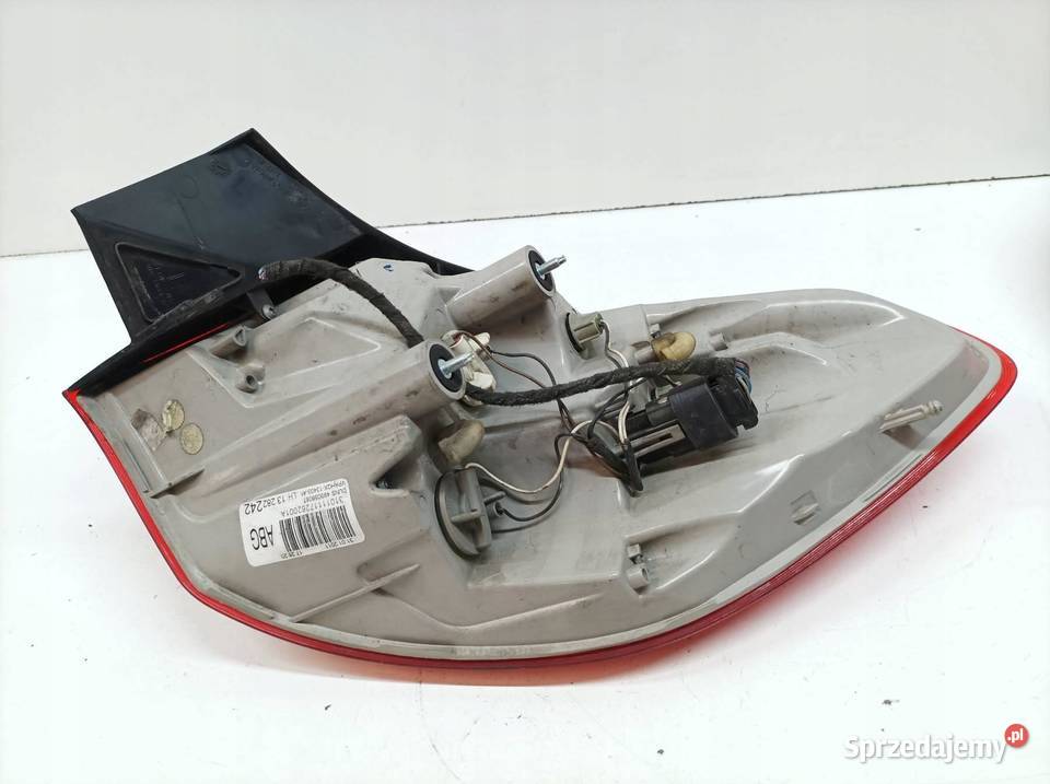 LAMPA TYŁ LEWA KOMBI 13282242 Opel Astra IV 2009