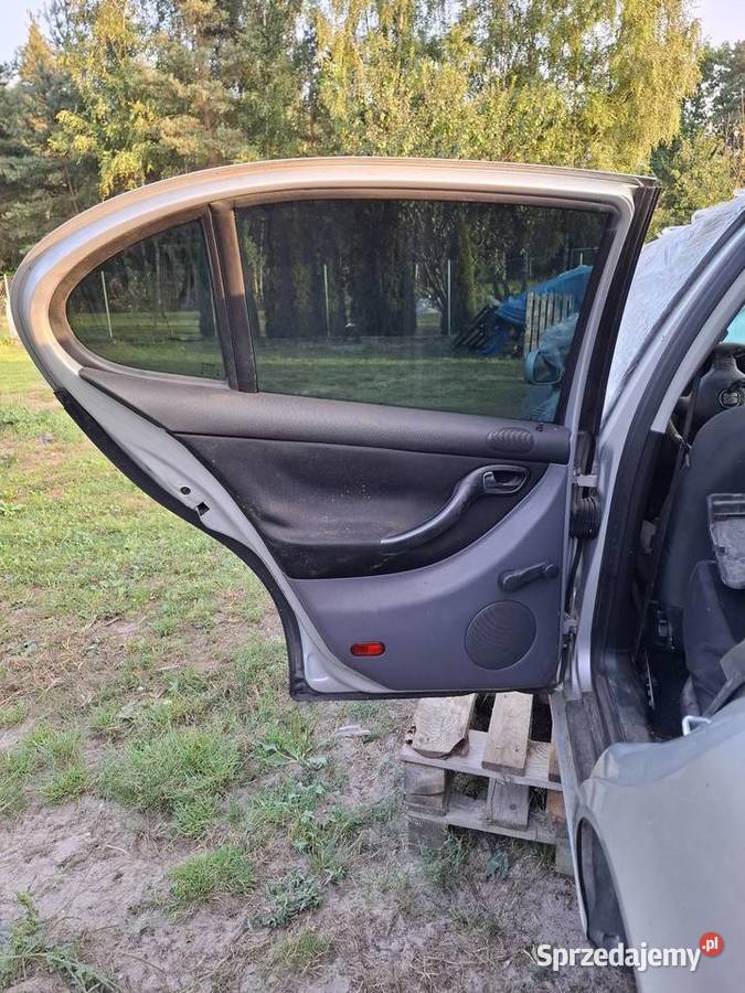 Drzwi lewy tył KOMPLETNE Seat Toledo II LS7N Przyborów