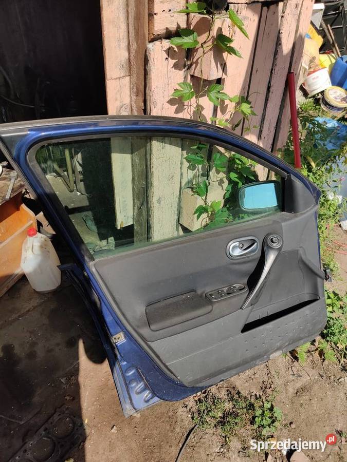 Drzwi przednie lewe Renault Megane II niebieskie manualna