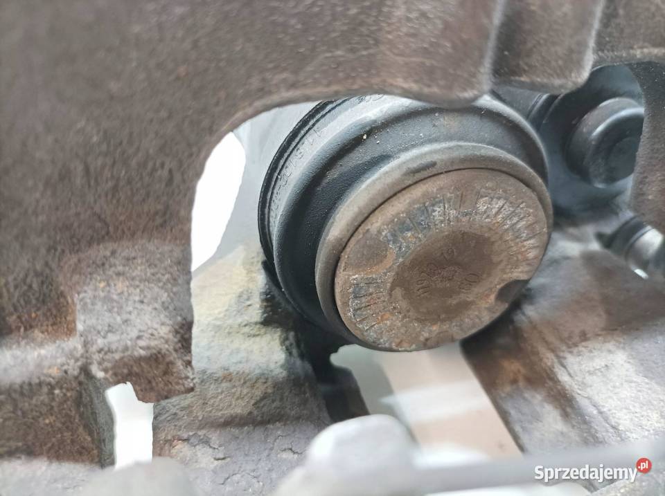 ZACISK HAMULCOWY PRAWY TYŁ ELEKTRYCZNY 20 TSI Rok produkcji 2019