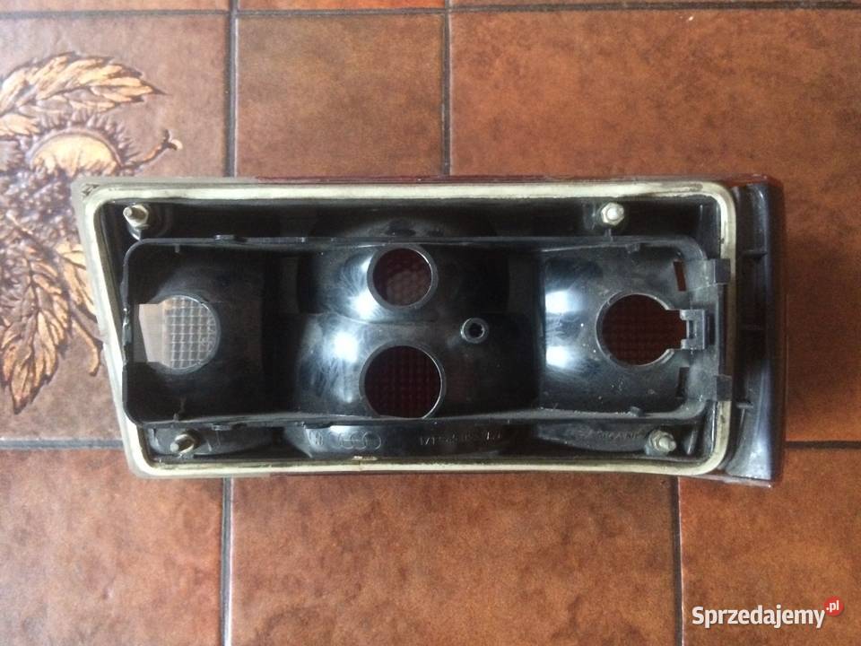 LAMPA LEWA VW GOLF I 77r 171945095 HELLA EUROPA Kutno