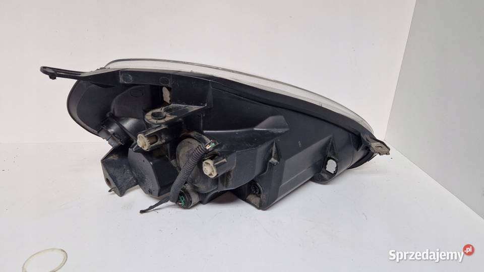 FIAT GRANDE PUNTO LAMPA PRZÓD PRZEDNIA LEWA osobowe Lampy przednie Słowikowo