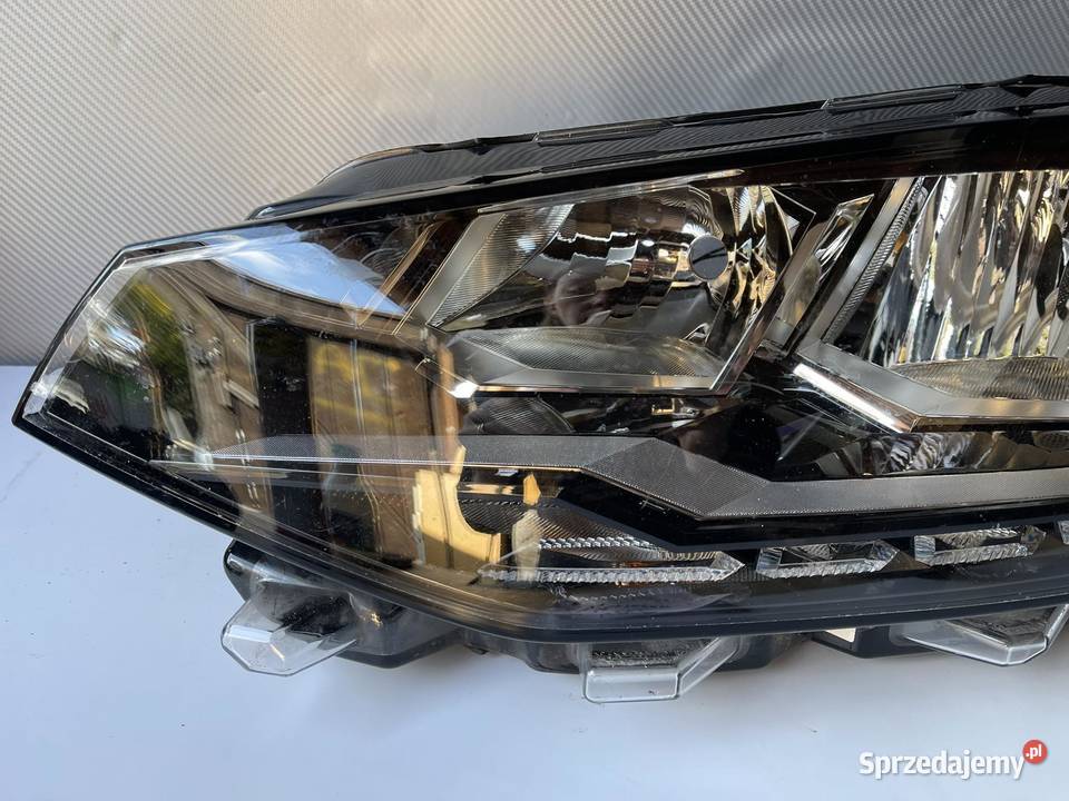 VW GOLF SPORTSVAN LIFT LEWA LAMPA PRZÓD osobowe Ostroróg
