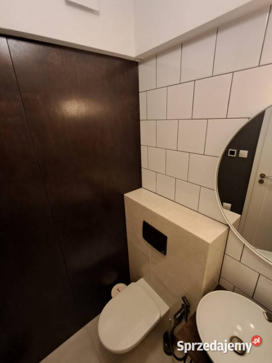 DWUPOZIOMOWY APARTAMENT Z OGRODEM Liczba pokoi 4 sprzedam