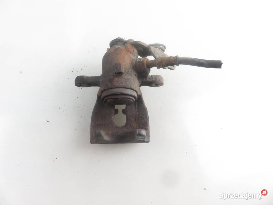 ZACISK LEWY TYŁ FORD MONDEO MK4 IV 20 TDCi UFBB