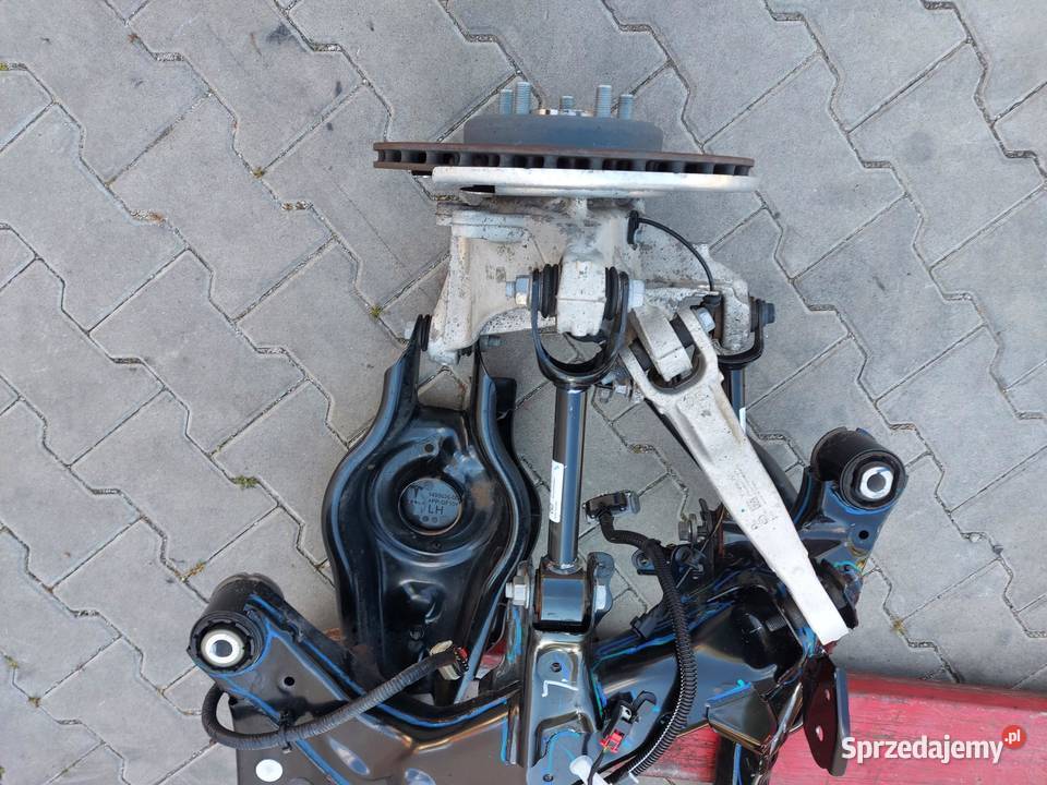 TESLA MODEL Y 2024r ZAWIESZENIE LEWE PRZÓD osobowe