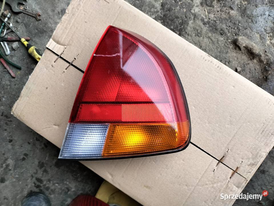 LAMPA TYŁ TYLNA PRAWA MITSUBISHI CARISMA Kamień-Kolonia