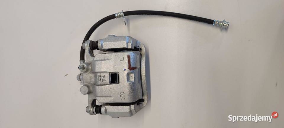 SUZUKI SWIFT MK9 ZACISK HAMULCOWY LEWY PRZÓD osobowe