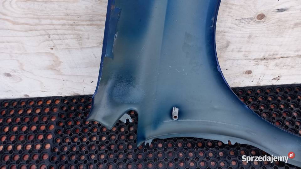 OPEL CORSA D BŁOTNIK PRZÓD LEWY Z21B Zbierkowo
