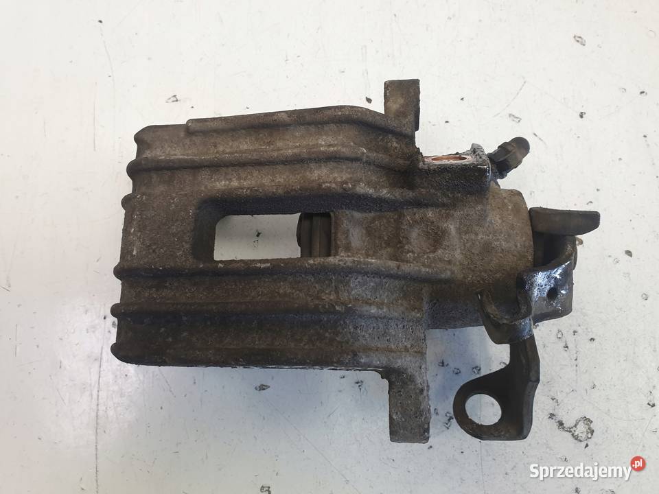 Skoda Octavia I ZACISK HAMULCOWY lewy TYŁ TYLNY osobowe
